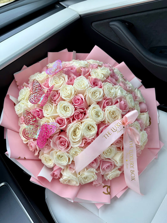 Pink and white long stem roses